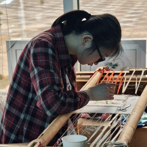 从四川通江绣女到非遗先锋：冉建华的蜀绣人生传奇